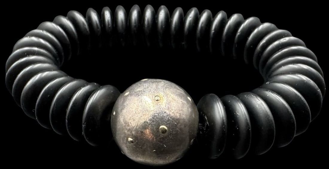 Very Unusual Vintage 800 Silver & Black Gemstone Bead Bracelet: Very good vintage condition with minor patina according to age. Measures approx. 3/4" wide and weighs ca. 63 grams. Bracelet is extendable.