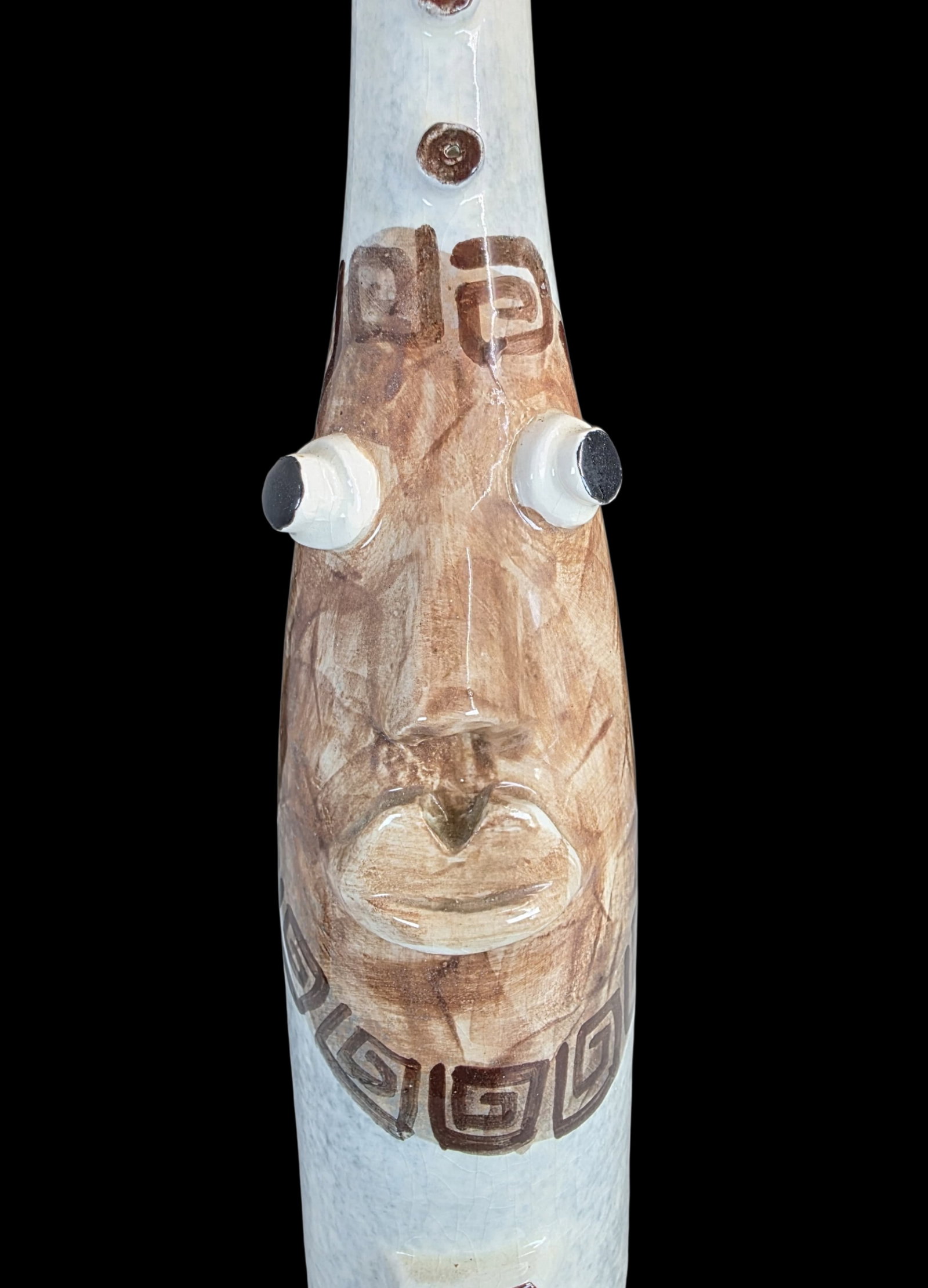 Vintage Mid-Century Modern California Art Pottery Face Bottle: Very good vintage condition; no chips, cracks, or repairs. Measures approx. 13 1/4" high x 2 3/4" in diameter (at the base). The wooden bottle stopper measures approx. 3" long and 1" in diameter. Sign