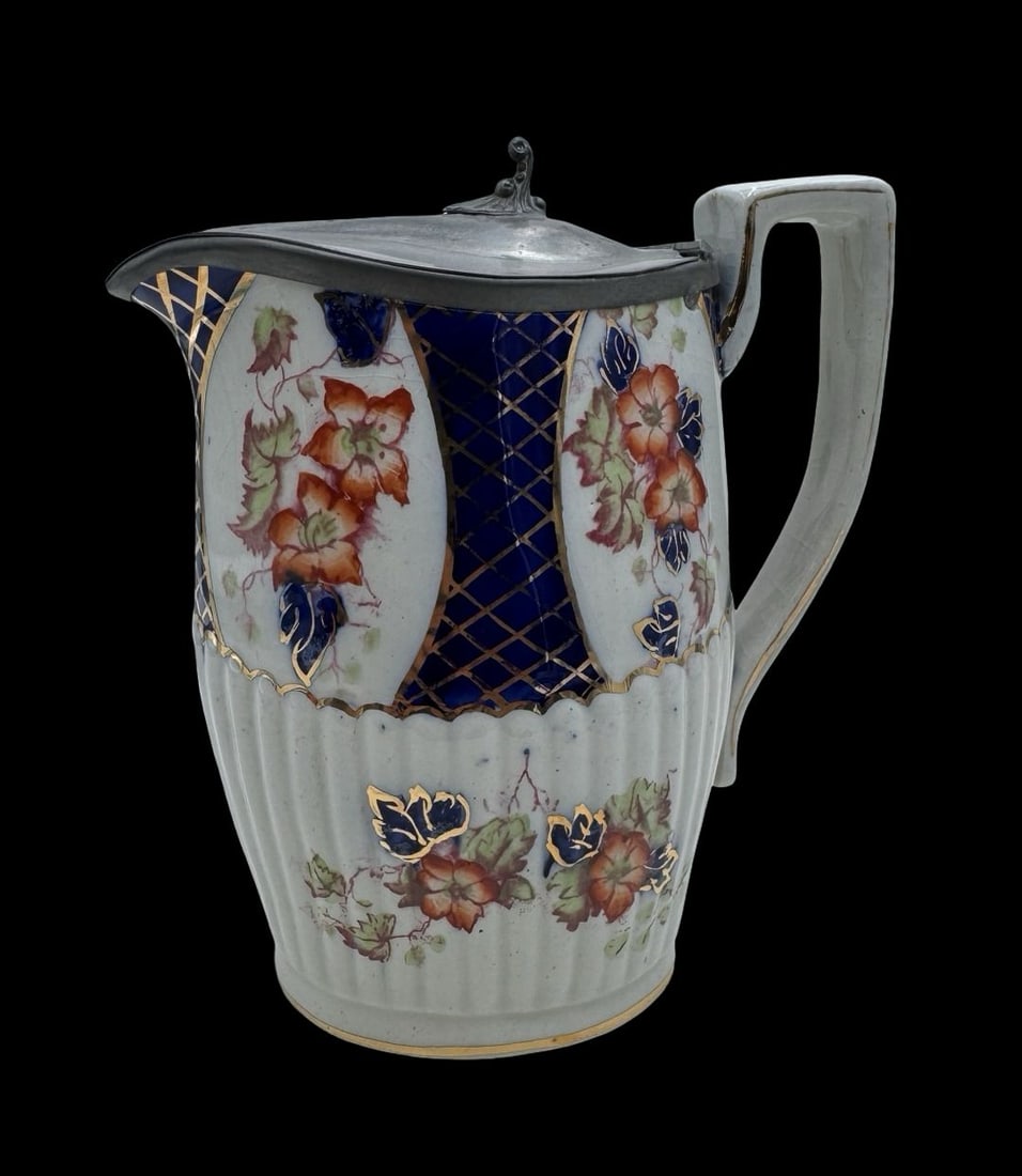 Antique ca. 1820 English Gaudy Welsh Pewter Mounted Ceramic Ewer: Good antique condition; no chips, cracks, or repairs; some wear according to age. Measures approx. 6.5" long, 3" wide, 7" high. Crafted from Ceramic.