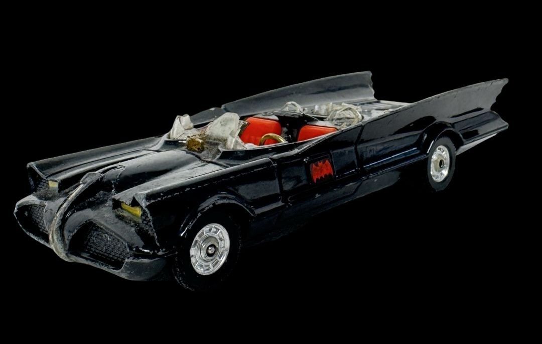 Vintage ca. 1960 CORGI TOYS United Kingdom Batman Batmobile Die Cast Toy: Good vintage condition with wear and patina according to use and age, please see pictures. Measures approx. 5 1/2" long and 2" wide and 1" high.