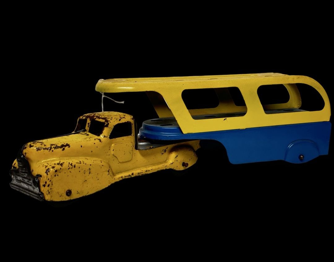 Vintage ca. 1950 MARX TOYS Pressed Steel Transport Car Hauler Truck Toy: Good vintage condition with wear and patina according to use and age, please see pictures. Measures approx. 14" long and 3" wide and 3 1/2" high.
