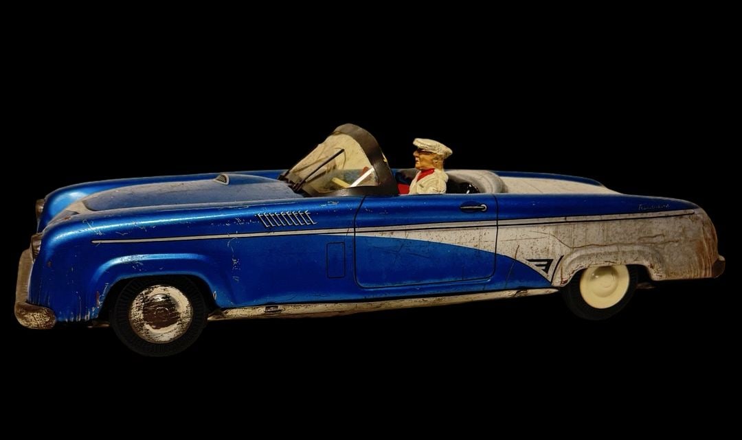 Vintage ca. 1950s PHILIPP NIEDERMEIER Germany Thunderbird Tin Friction Toy Car: Good vintage condition with wear and patina according to use and age, please see pictures. Measures approx. 13" long and 5" wide and 3" high.