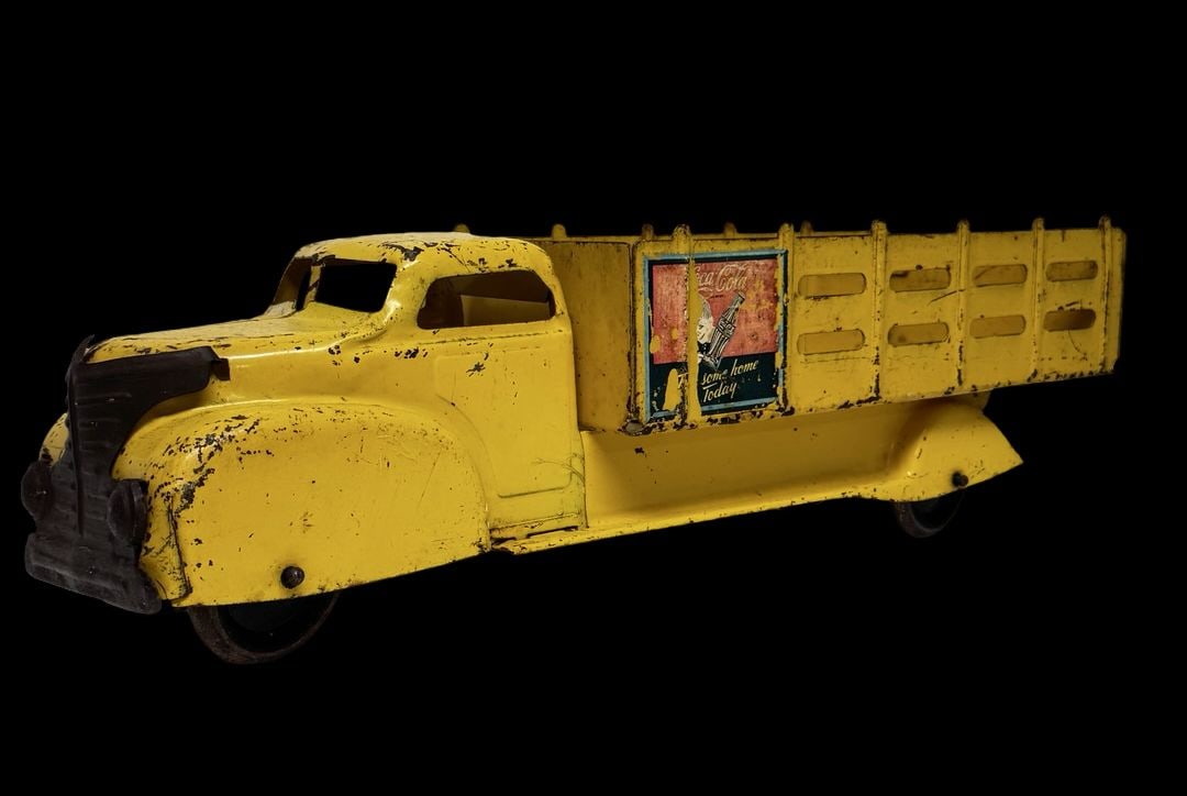 Vintage Ca. 1950s MARX TOYS Pressed Steel Coca-Cola Delivery Truck Toy: Good vintage condition with wear and patina according to use and age, please see pictures. Measures approx. 20 1/2" long and 6" wide and 5" high.
