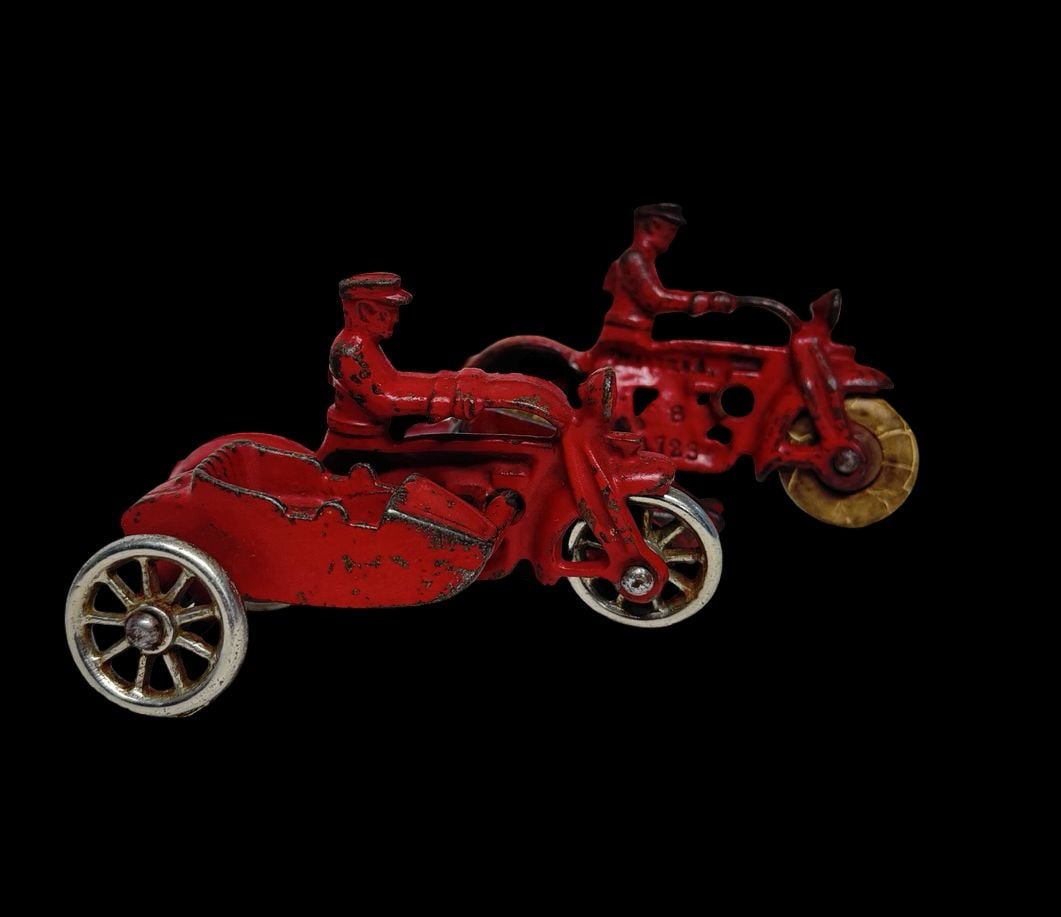 Antique HUBLEY Manufacturing Company Cast Iron Red Motorcycle Cop Toy: Good antique condition with wear and patina according to use and age, please see pictures. Measures approx. 4" long and 2" wide and 2" high. One Piece on the Side is broken.