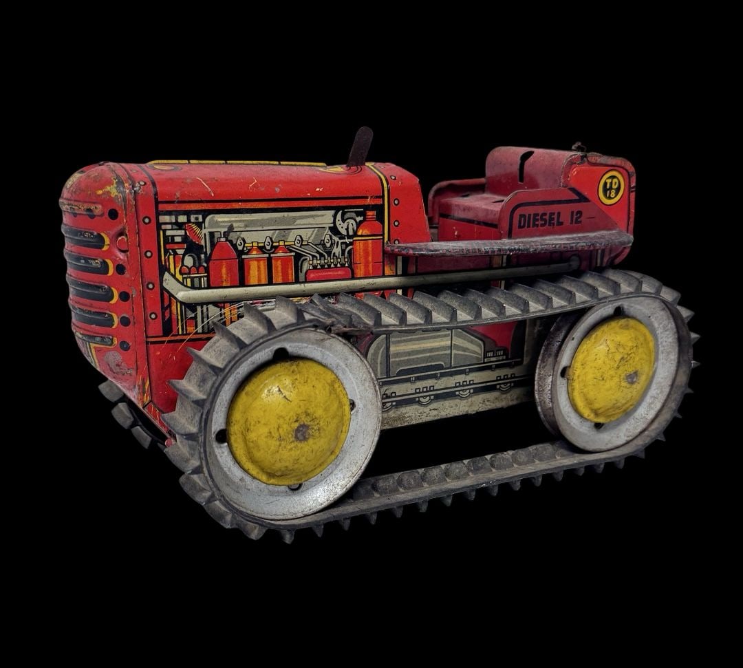Vintage MARX Wind-Up Tin Toy Painted Farm Diesel 12 Tractor w/ Tread: Good vintage condition with wear and patina according to use and age, please see pictures. Measures approx. 9" long and 5" wide and 5" high.