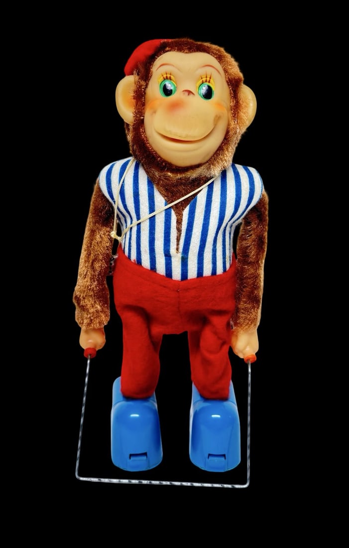 Vintage Ca. 1960s TN NOMURA Skipping Monkey Battery Operated Toy: Good vintage condition with wear and patina according to use and age, please see pictures. Measures approx. 10" long and 5" wide and 4" high. Made in Japan.