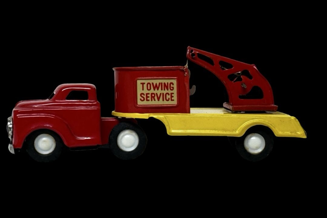 Vintage ca. 1950s MARX TOYS Friction Wrecker Truck Toy: Good vintage condition with wear and patina according to use and age, please see pictures. Measures approx. 2 1/2" long and 2" wide and 4" high.