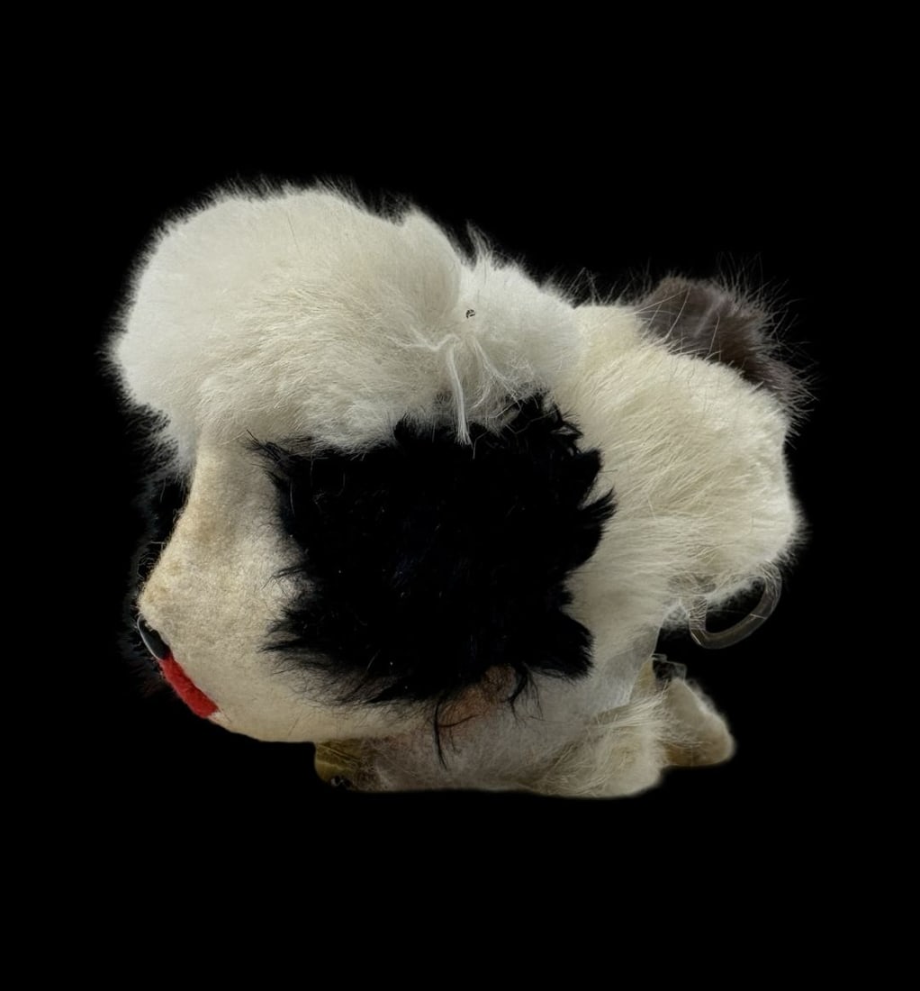 Vintage Ca. 1950s Japanese Hoppity Doggy Mechanical Wind-Up Toy: Good vintage condition with wear and patina according to use and age, please see pictures. Measures approx. 8" long and 5" wide and 4" high. Made in Japan.