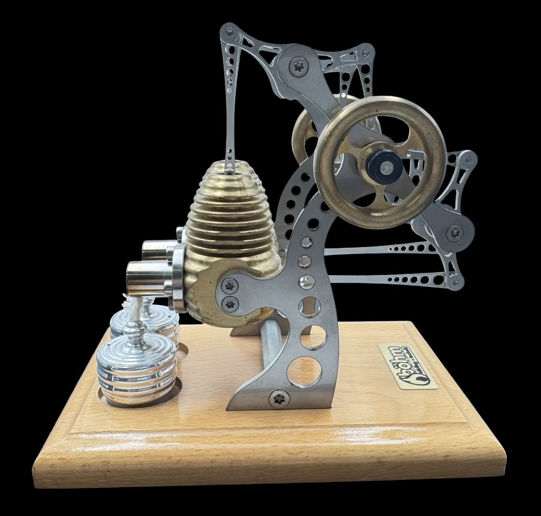 Functional Vintage BOEHM Germany Hand Made Stirling Engine Model: Very good vintage condition with minor patina according to age; works. Measures approx. 6 1/4" high x 6 1/4" wide x 4" deep.