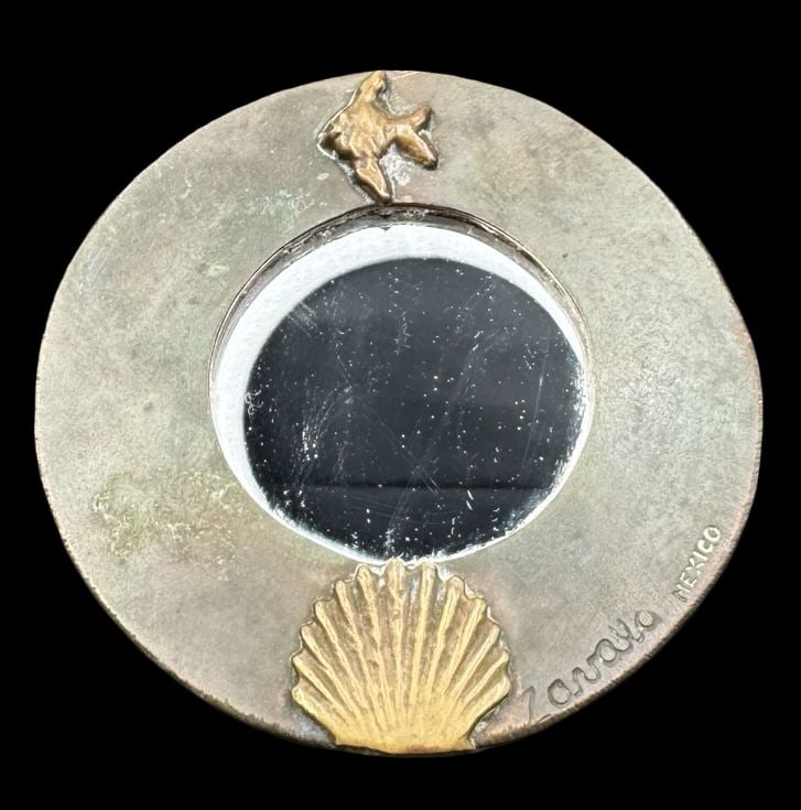 Rare Vintage ENRIQUE ZAVALA Mexico Silver Metal & Brass Mirror Pendant / Wall Art: Very good vintage condition with minor patina according to age. Measures approx. 2 1/2" in diameter. Marked for Designer ZAVALA & Mexico.