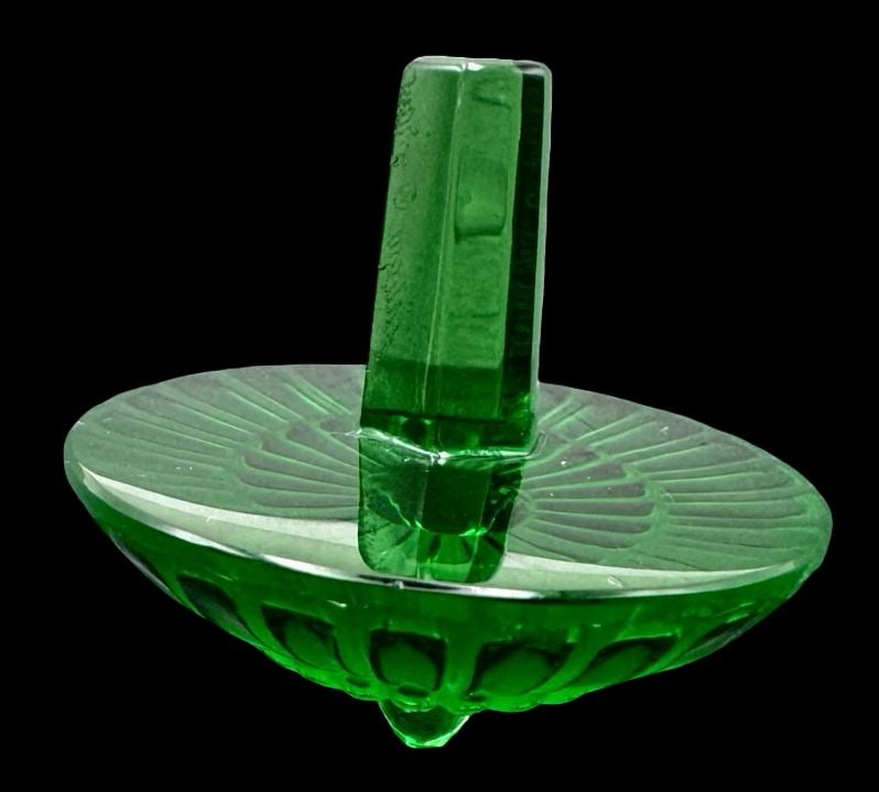 Vintage LALIQUE France Green Crystal Spinning Top: Very good vintage condition. No chips, cracks, or repairs. Measures approx. 1 1/4" high x 1 3/8" in diameter. Signed for LALIQUE France.