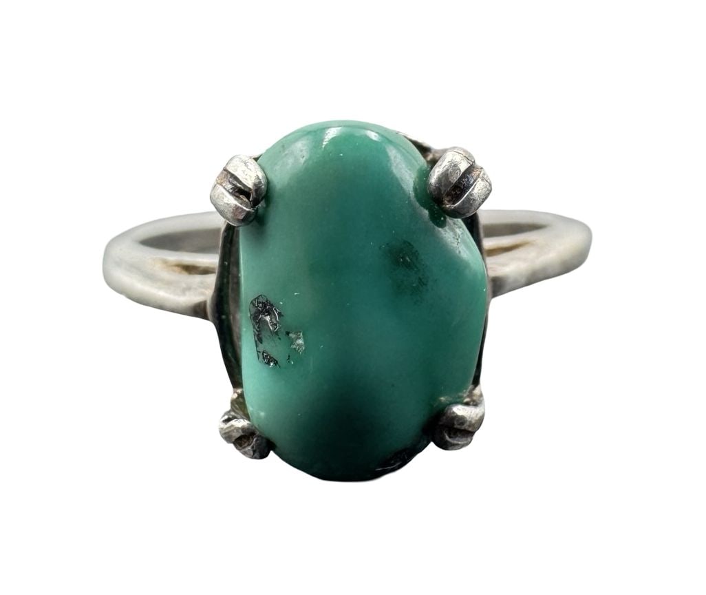 Beautiful Vintage Southwestern Sterling Silver & Turquoise Ring: Good vintage condition w/ patina and wear according to age and use, see pictures. Measures approx. 1" long, 3/4" wide. Weighs approx. 2.16 grams. The ring is a size 5. Marked for Sterling Silver.