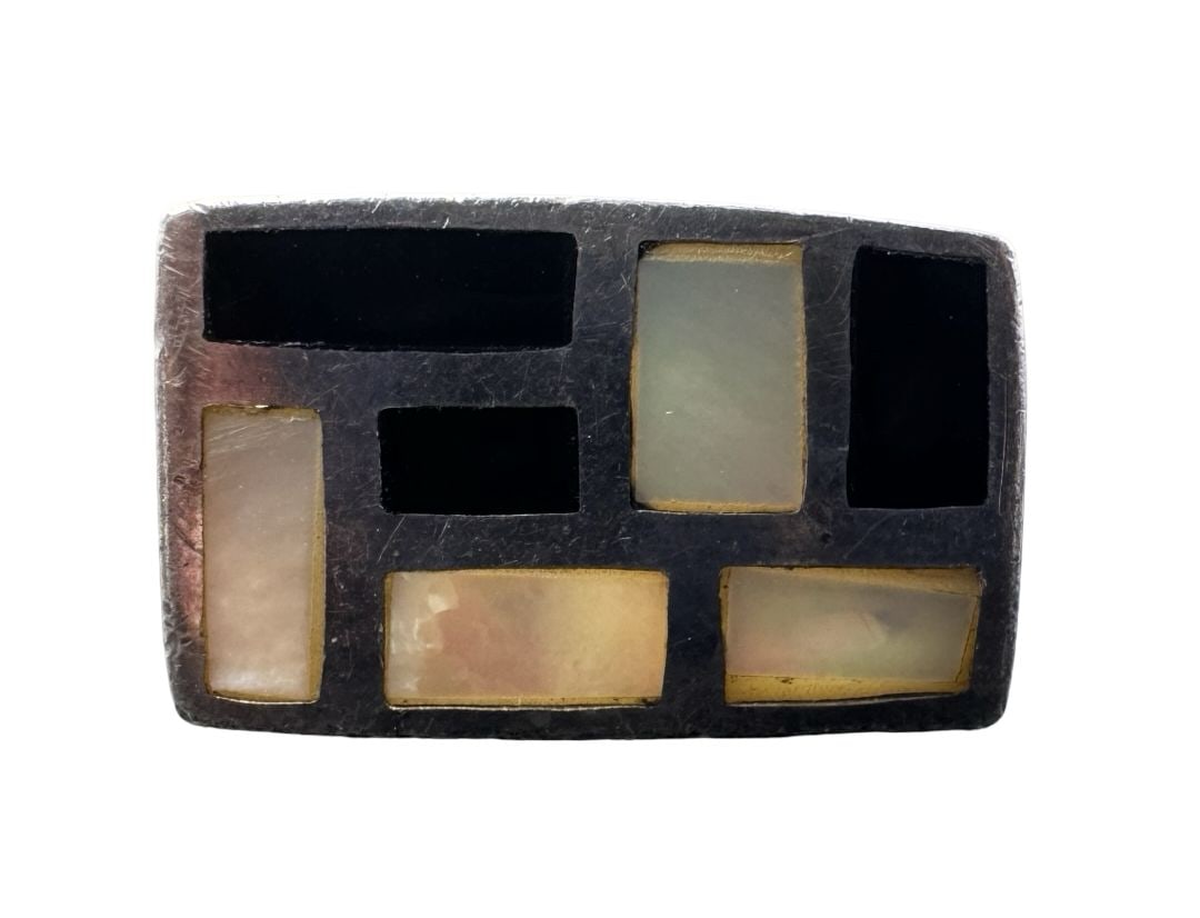 Amazing Vintage Modernist Sterling Silver, Mother of Pear & Onyx Ring: Good vintage condition w/ patina and wear according to age and use, see pictures. Measures approx. 1" long, 1" wide. Weighs approx. 7.91 grams. The ring is a size 5.5. Marked for Sterling Silver.