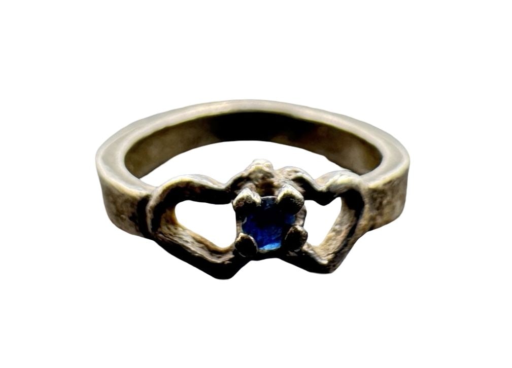 Vintage Sterling Silver Claddagh Ring w/ Blue Gemstone & Heart Design: Good vintage condition w/ patina and wear according to age and use, see pictures. Measures approx. 1/2" long, 1/2" wide. Weighs approx. 1.37 grams & the ring is a size is 1. Tested for Sterling Silver