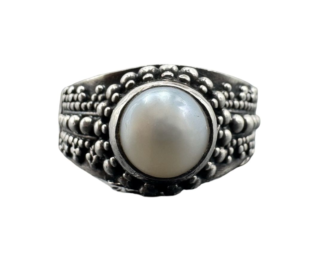 Amazing Vintage Bali Style Sterling Silver Ring w/ Pearl and Pebbled Band: Good vintage condition w/ patina and wear according to age and use, see pictures. Measures approx. 1" long, 1" wide. Weighs approx. 6.48 grams & the ring is a size is 5.5. Marked for Sterling Silver.