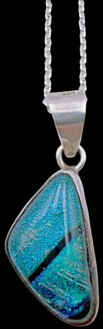 Beautiful Vintage Sterling Silver Necklace w/ Blue Art Glass Pendant: Good vintage condition w/ patina and wear according to age and use, see pictures. Pendant Measures approx. 1 3/4" long and 3/4" wide and weighs ca. 17.4 grams. Necklace is 24" long and 1/8" wide. Mark