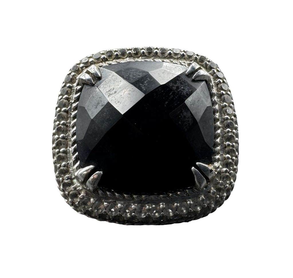 Beautiful & Heavy Vintage Sterling Silver Ring w/ Large Faceted Black Onyx: Good vintage condition w/ patina and wear according to age and use, see pictures. Measures approx. 1.25" long, 1" wide. Weighs approx. 15.86 grams. The ring is a size is 8.5. Marked Sterling Silver.