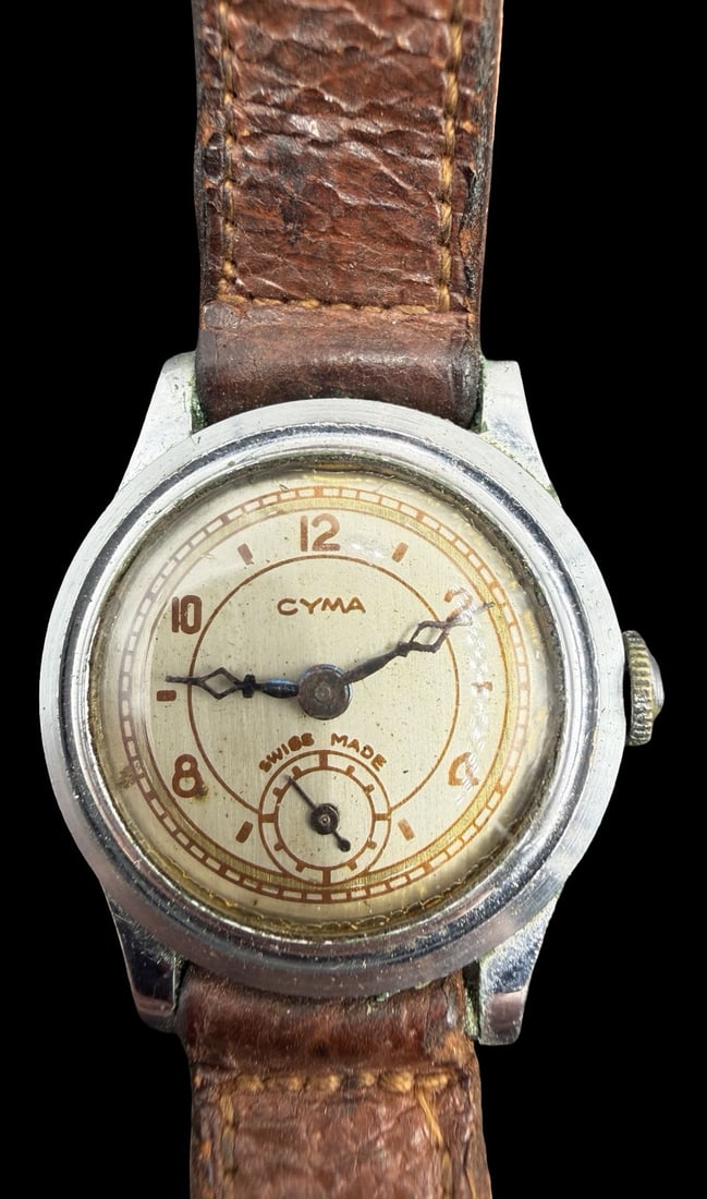 Amazing Vintage CYMA Stainless Steel & Brown Leather Strap Quartz Watch w/ Box: Good vintage condition w/ patina and wear according to age and use, see pictures. Dial measures approx. 3/4" long and 3/4" wide and weighs ca. 21.4 grams. Marked for CYMA. The timepiece is currently n