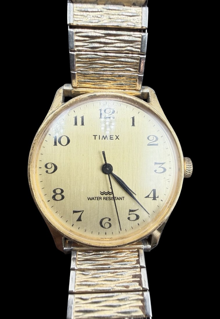 Gorgeous Ornate Vintage TIMEX Stainless Steel Gold Tone Water Resistant w/ Stretchable Strap Quartz: Good vintage condition w/ patina and wear according to age and use, see pictures. Measures approx. 1" long and 1" wide. Marked for TIMEX. Watch isn't working.