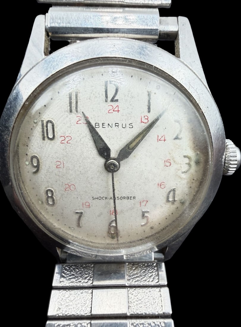 Gorgeous Vintage BENRUS Stainless Steel Gold Tone & Stretchable Strap Quartz Watch: Good vintage condition w/ patina and wear according to age and use, see pictures. Measures approx. 1" long and 1" wide. Marked for BENRUS. Watch isn't working.