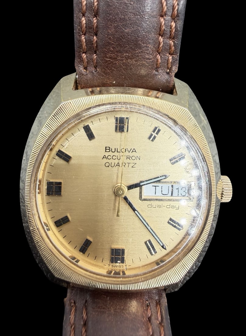 Amazing Ornate Vintage BULOVA 10K Gold Plated & Brown Leather Strap Quartz Watch: Good vintage condition w/ patina and wear according to age and use, see pictures. Dial measures approx. 1" long and 1" wide and weighs ca. 45.8 grams. Marked for BULOVA. The timepiece is working.