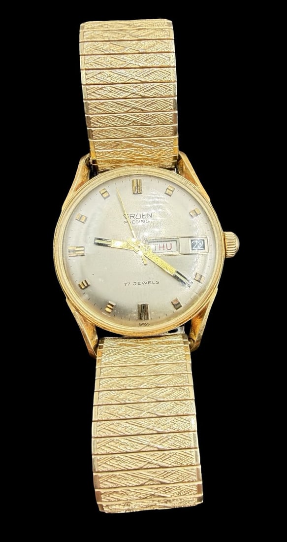 Beautiful Ornate Vintage GRUEN Gold-Tone Case 17 Jewels Wristwatch: Good vintage condition w/ patina and wear according to age and use, see pictures. Dial measures approx. 1 1/4" long and 1 1/4" wide and the piece weighs ca. 54.5 grams. Marked for GRUEN. The timepiece