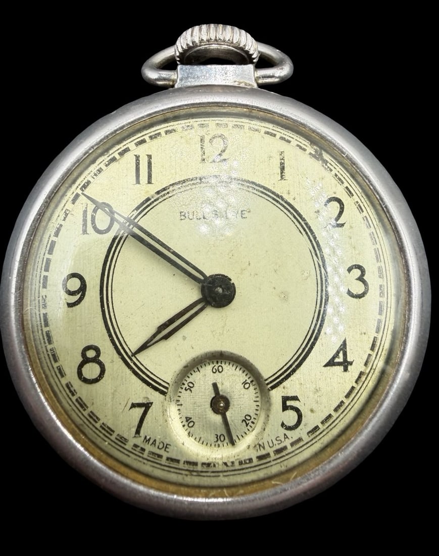 Gorgeous Vintage BULLS EYE Silver-Tone Metal Pocket Watch: Good vintage condition w/ patina and wear according to age and use, see pictures. Dial measures approx. 1 1/2" long and 1 1/2" wide and the piece weighs ca. 58.4 grams. Marked for BULLS EYE. The timep