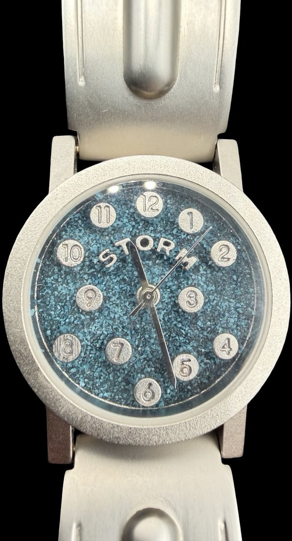 Gorgeous Vintage STORM Stainless Steel Gold Tone & Green Dial Women's Watch: Good vintage condition w/ patina and wear according to age and use, see pictures. Measures approx. 1 1/4" long and 1 1/4" wide. Marked for STORM. Watch is working.