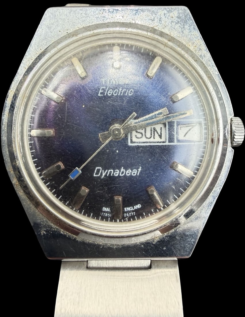 Gorgeous Vintage TIMEX Stainless Steel Gold Tone & Black Dial Watch: Good vintage condition w/ patina and wear according to age and use, see pictures. Measures approx. 1" long and 1" wide. Marked for TIMEX. Watch isn't working.