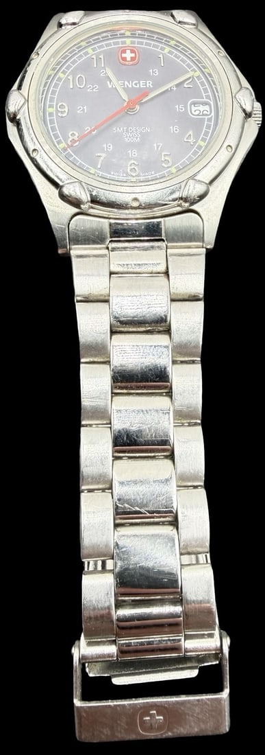 Amazing Vintage WENGER Stainless Steel Gold Tone & Black Dial Watch: Good vintage condition w/ patina and wear according to age and use, see pictures. Measures approx. 1" long and 1" wide. Marked for WENGER. Watch isn't working.