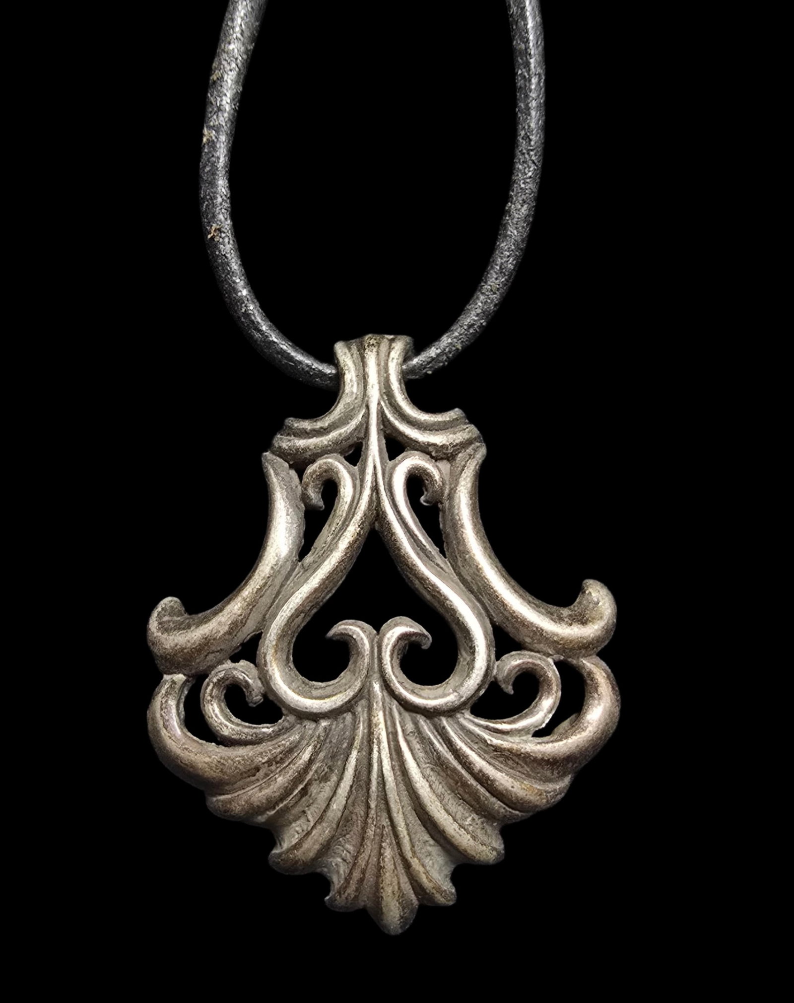 Ornate Vintage Sterling Silver Art Nouveau Scrollwork Pendant Leather Cord Necklace: Good vintage condition w/ patina and wear according to age and use, see pictures. Pendant measures approx. 1 1/2" wide and and total weight is ca. 20 grams. Necklace is 24" long. Marked Sterling Silve