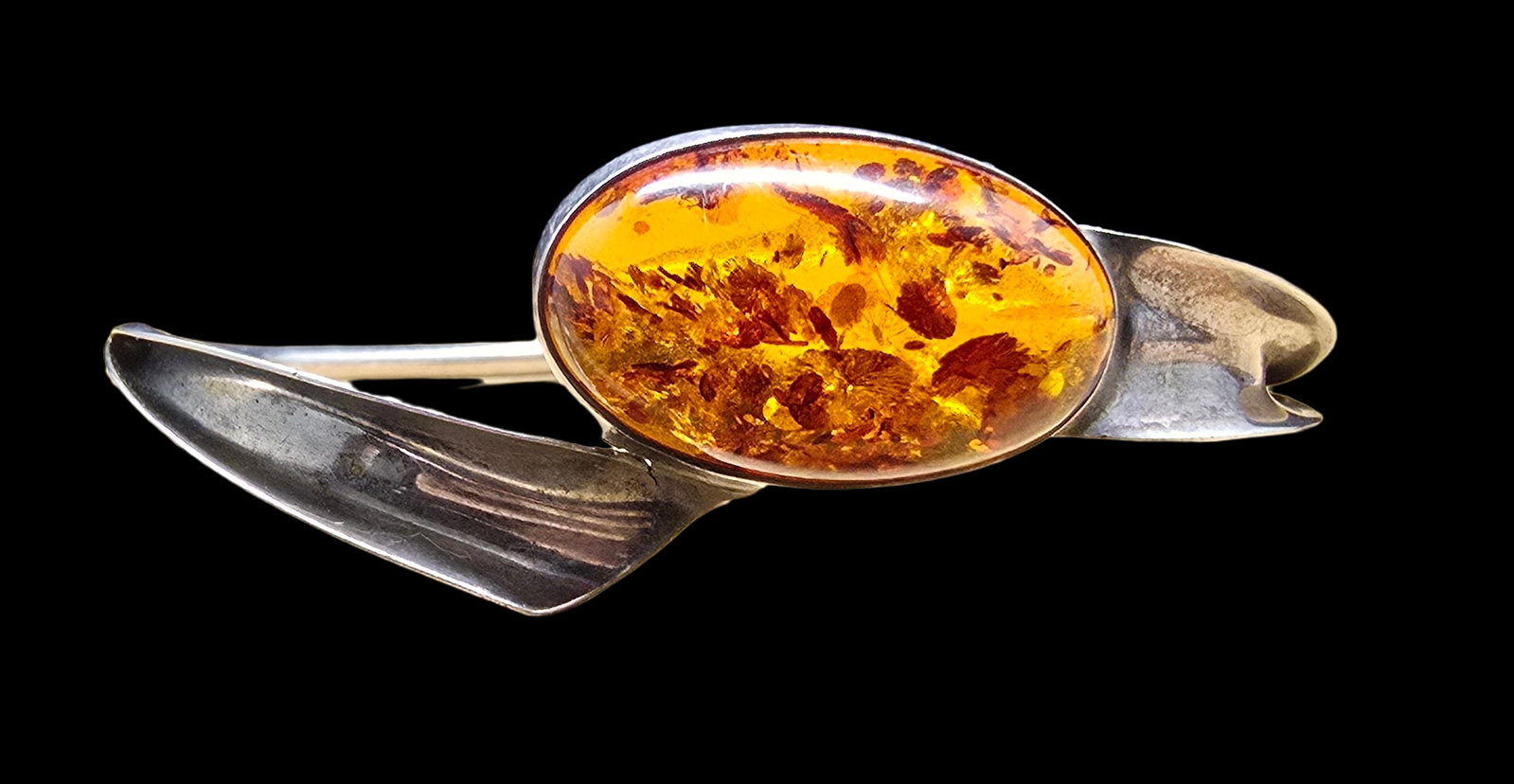 Gorgeous Vintage Scandinavian Modernist Sterling Silver Oval Baltic Amber Cuff Bracelet: Good vintage condition w/ patina and wear according to age and use, see pictures. Measures approx. and weighs ca. 11 grams. Tested for Sterling Silver