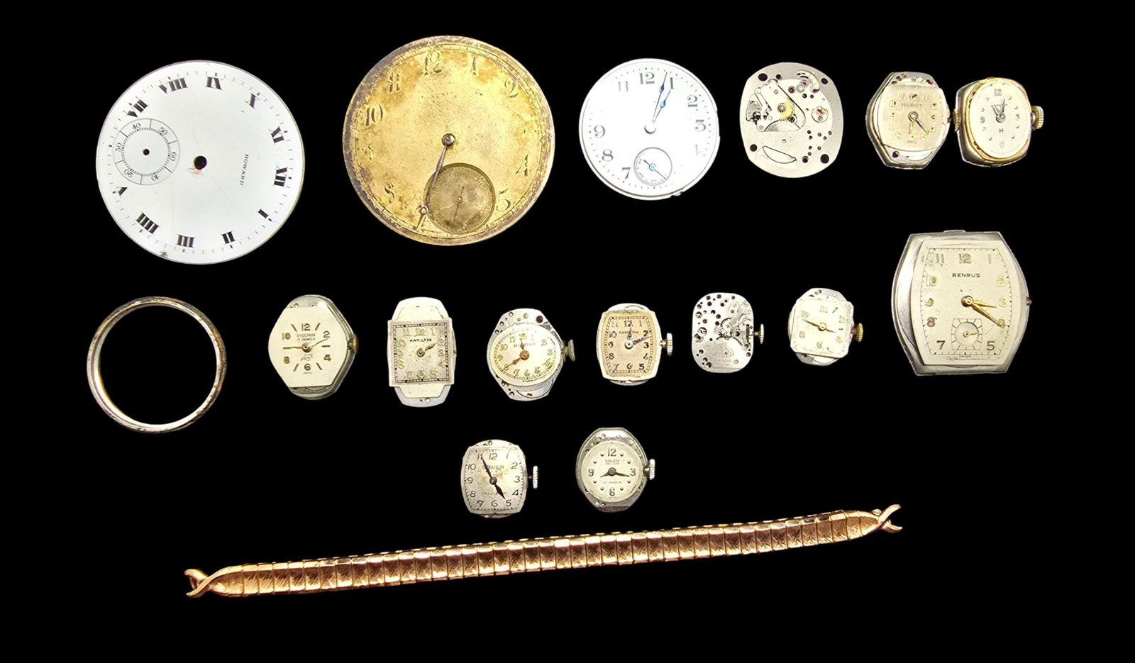 Lot of Vintage Watch Movements, Watch Parts and a Gold Filled Bracelet: Good vintage condition w/ patina and wear according to age, see pictures. The largest piece measures approx. 2" high and 2" wide and the entire lot weighs ca. 120 grams. Untested.