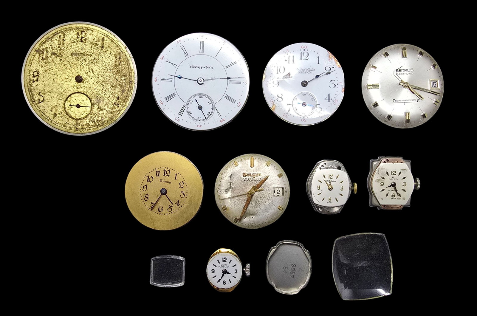 Lot of Vintage Watch Movements: Good vintage condition w/ patina and wear according to age, see pictures. The largest piece measures approx. 1 1/2" high and 1 1/2" wide and the entire lot weighs ca. 160 grams. Untested.