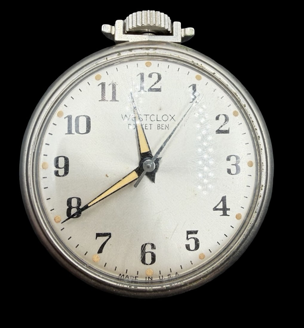 Vintage WESTCLOX Silver-Tone Metal & White Dial Pocket Watch: Good vintage condition w/ patina and wear according to age and use, see pictures. Dial measures approx. 1 3/4" long and 1 3/4" wide and weighs ca. 38.6 grams. The timepiece is functional.