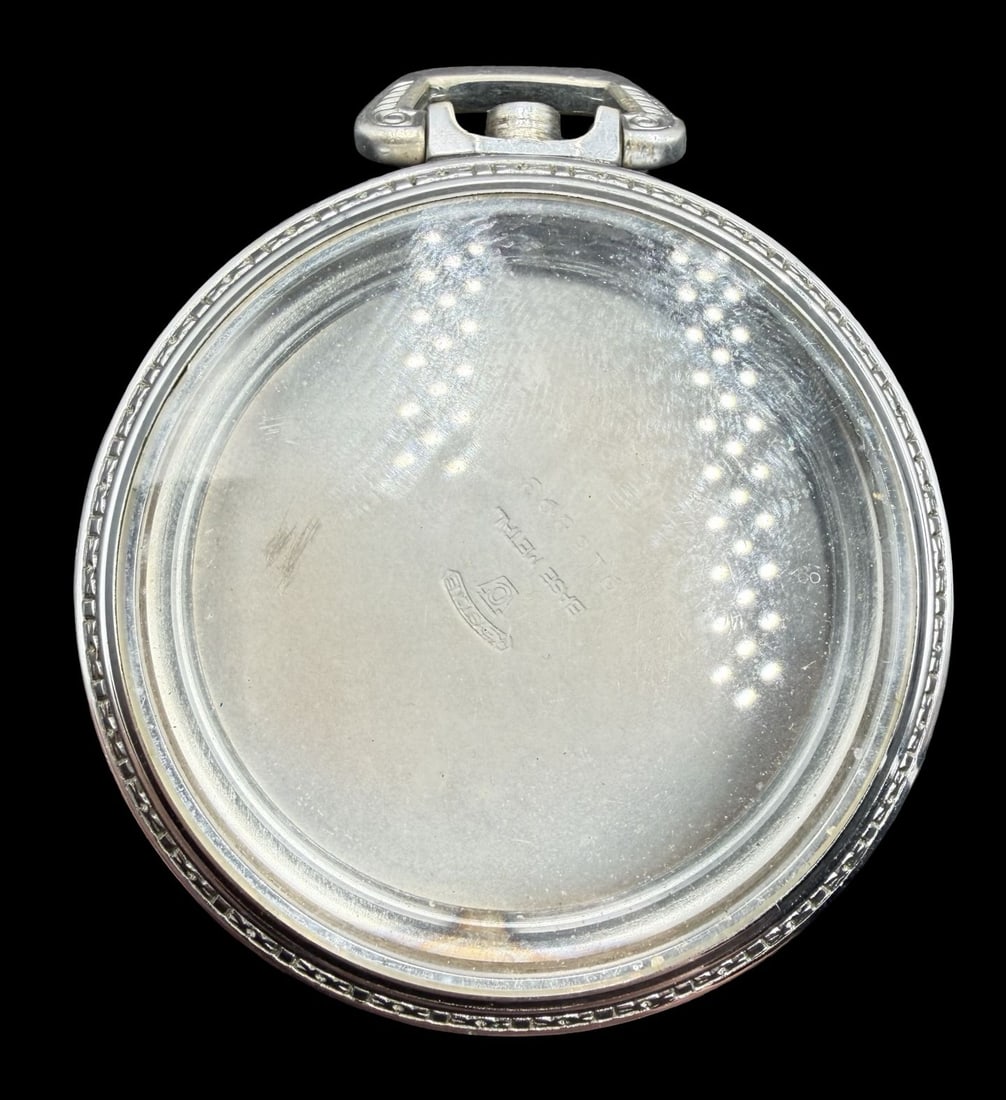 Vintage Silver-Tone Metal Pocket Watch Case: Good vintage condition w/ patina and wear according to age and use, see pictures. Measures approx. 1 1/2" long and 1 1/2" wide and weighs ca. 56.2 grams.