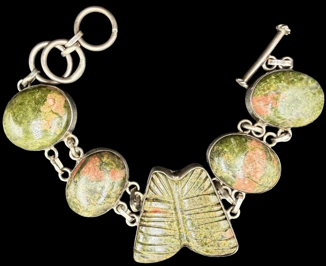 Stunning Vintage Sterling Silver w/ Carved Unakit Butterfly Figure Gemstone Bracelet: Good vintage condition w/ patina and wear according to age and use, see pictures. Measures approx. 8" long and 1" wide and weighs ca. 57.2 grams. Charm Measures approx. 1 1/4" long and 1 1/4" wide. Ma