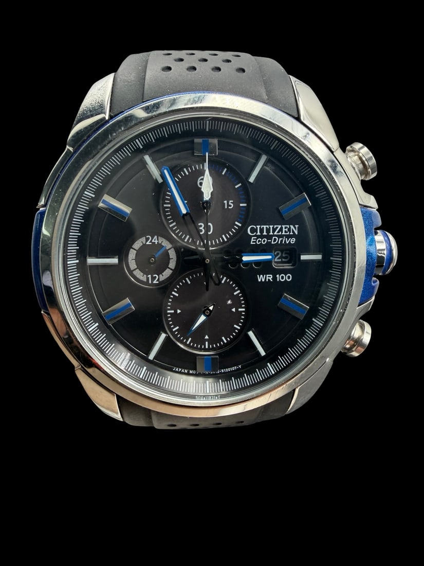 Vintage CITIZEN ECO-DRIVE WR 100 Stainless Steel & Black/Blue Dial Solar Watch: Good vintage condition w/ patina and wear according to age and use, see pictures. Dial measures approx. 1 1/2" long and 1 1/2" wide and weighs ca. 77.27 grams. Marked for CITIZEN. The timepiece is wor