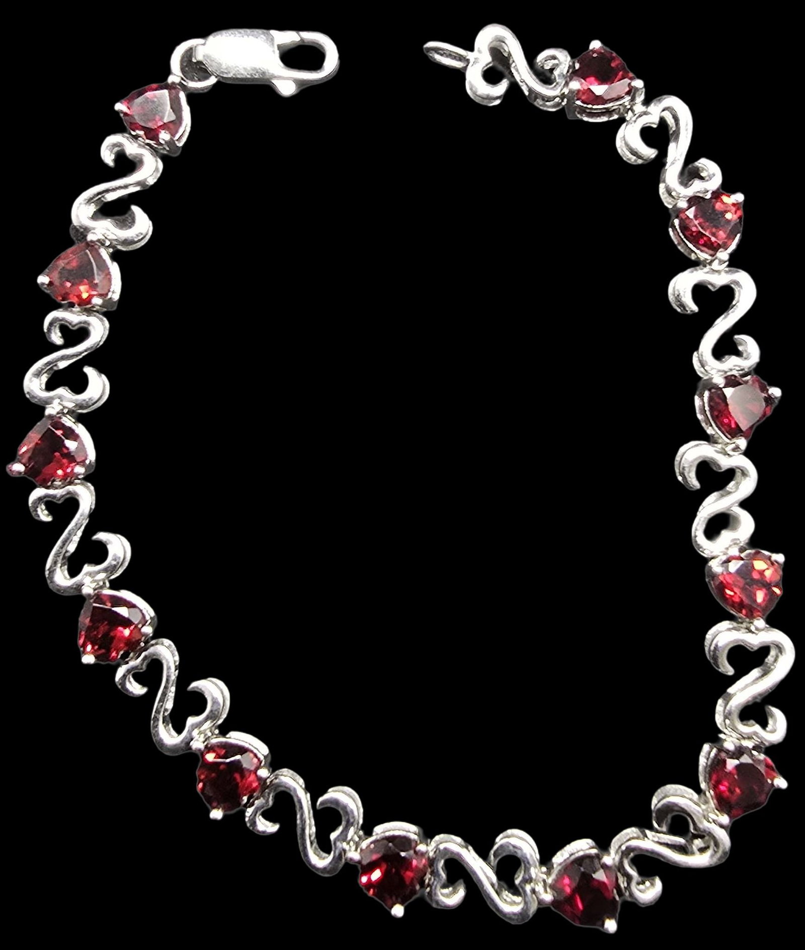 Beautiful Ornate Vintage Sterling Silver & Red Gemstones Magic Fireball Bracelet: Good vintage condition w/ patina and wear according to age and use, see pictures. Weighs ca. 8.5 grams. Marked Sterling Silver