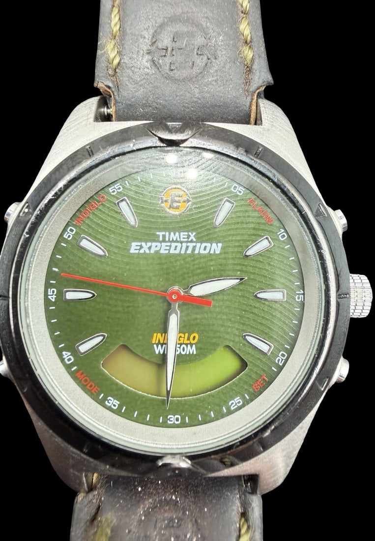 Vintage TIMEX EXPEDITION Stainless Steel & Green Dial Watch: Good vintage condition w/ patina and wear according to age and use, see pictures. Dial measures approx. 1" long and 1" wide and weighs ca. 60.12 grams. Marked for TIMEX. Requires a battery, not tested