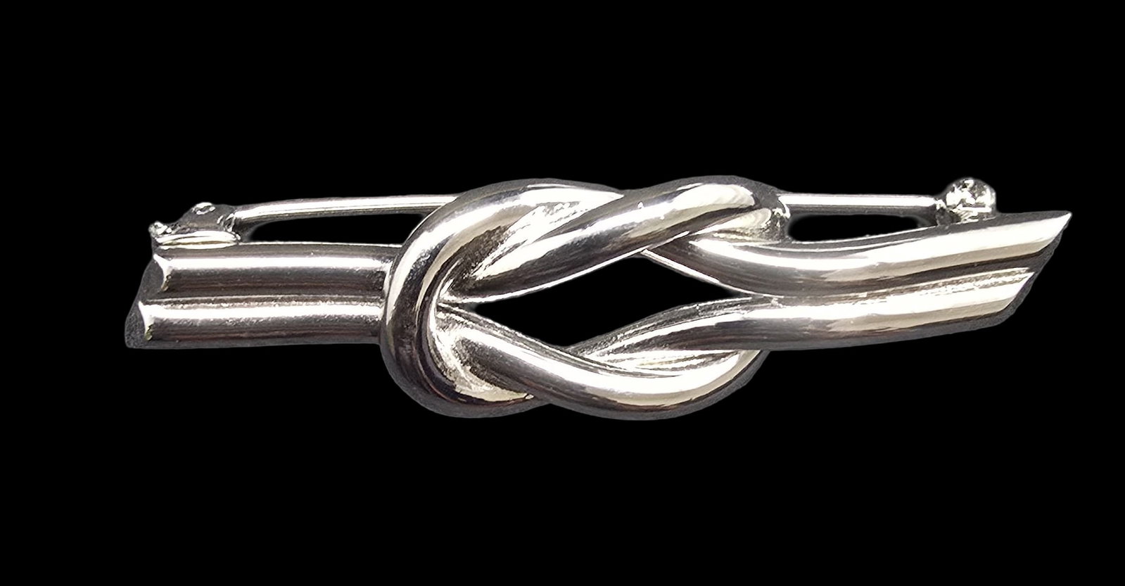 Beautiful Ornate Vintage Sterling Silver Knot Brooch Pin: Good vintage condition w/ patina and wear according to age and use, see pictures. Measures approx 2" wide. Weighs ca. 12.5 grams. Marked Sterling Silver