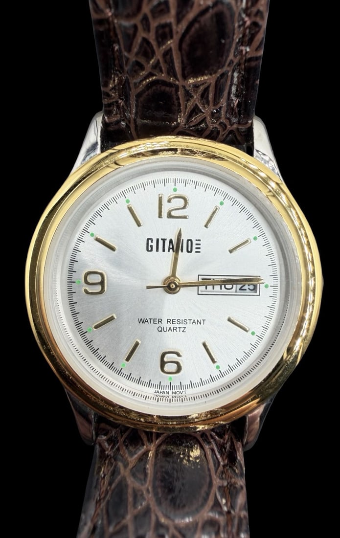 Amazing Vintage GITANO Stainless Steel & White Dial Quartz Watch w/ Box: Good vintage condition w/ patina and wear according to age and use, see pictures. Dial measures approx. 1" long and 1" wide and weighs ca. 32.5 grams. Marked for GITANO. The timepiece is currently not