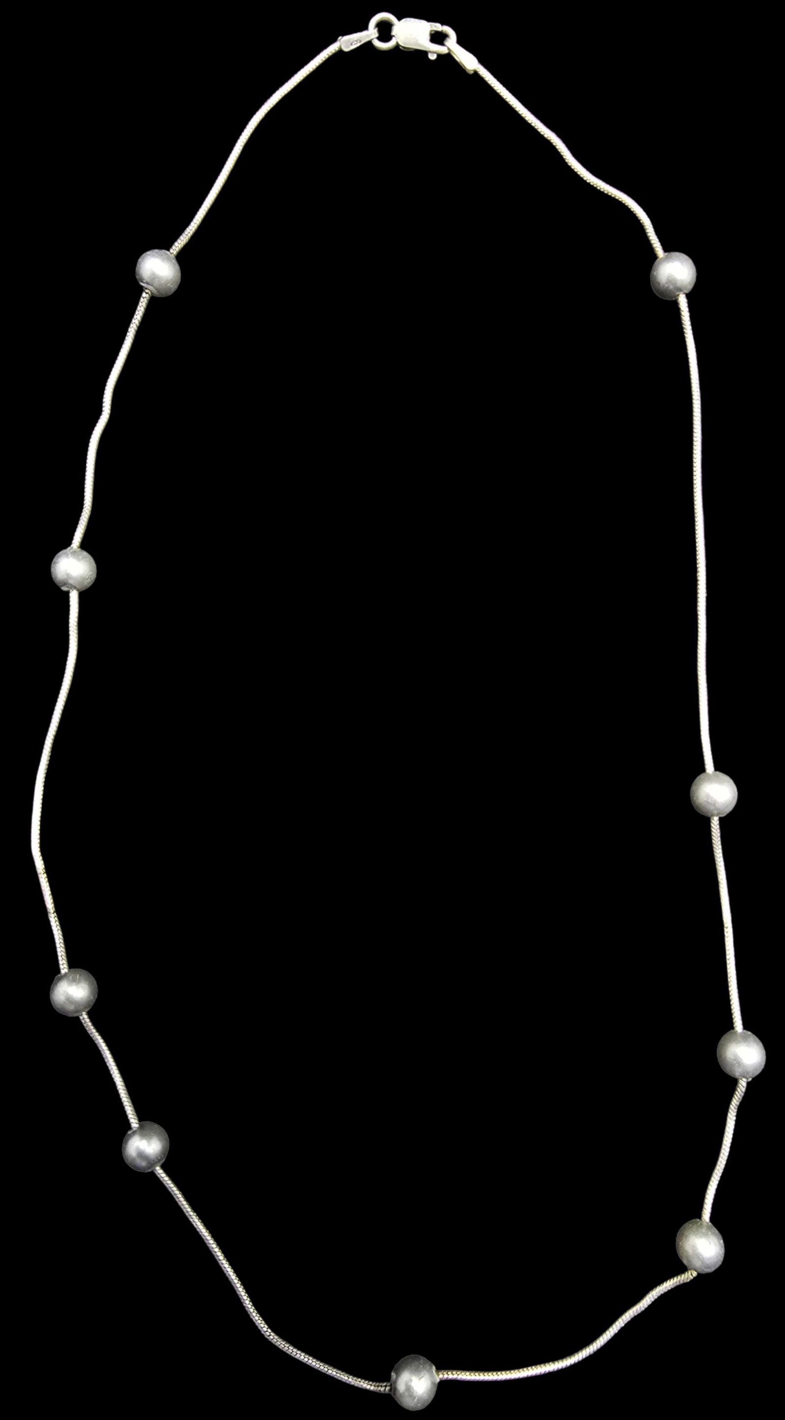 Stylish Vintage Sterling Silver Bead Necklace: Good vintage condition w/ patina and wear according to age and use, see pictures. Measures approx. 16" long and weighs ca. 5 grams. Marked Sterling Silver.