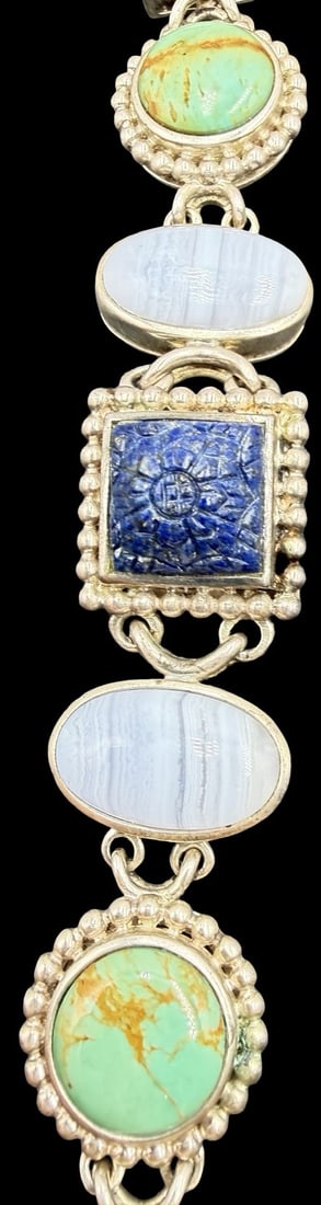 Stunning Ornate Vintage Sterling Silver & Multi-colored Gemstone Bracelet: Good vintage condition w/ patina and wear according to age and use, see pictures. Measures approx. 7" long and 1" wide and weighs ca. 53 grams. Tested Sterling Silver