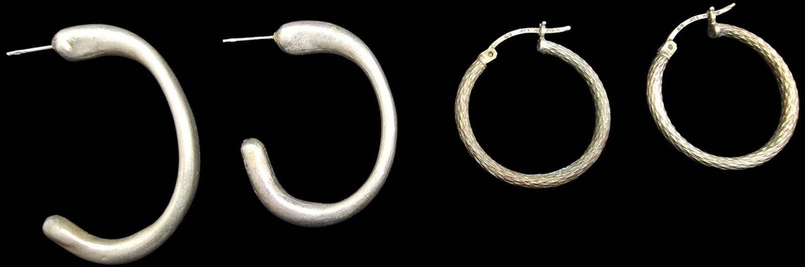 Lot of 2 Pairs of Vintage European Sterling Silver Hoop Earrings: Good vintage condition w/ patina and wear according to age and use, see pictures. Each measures approx. 1" long x 1" wide and they jointly weigh ca. 7.5 grams. Marked Sterling Silver.