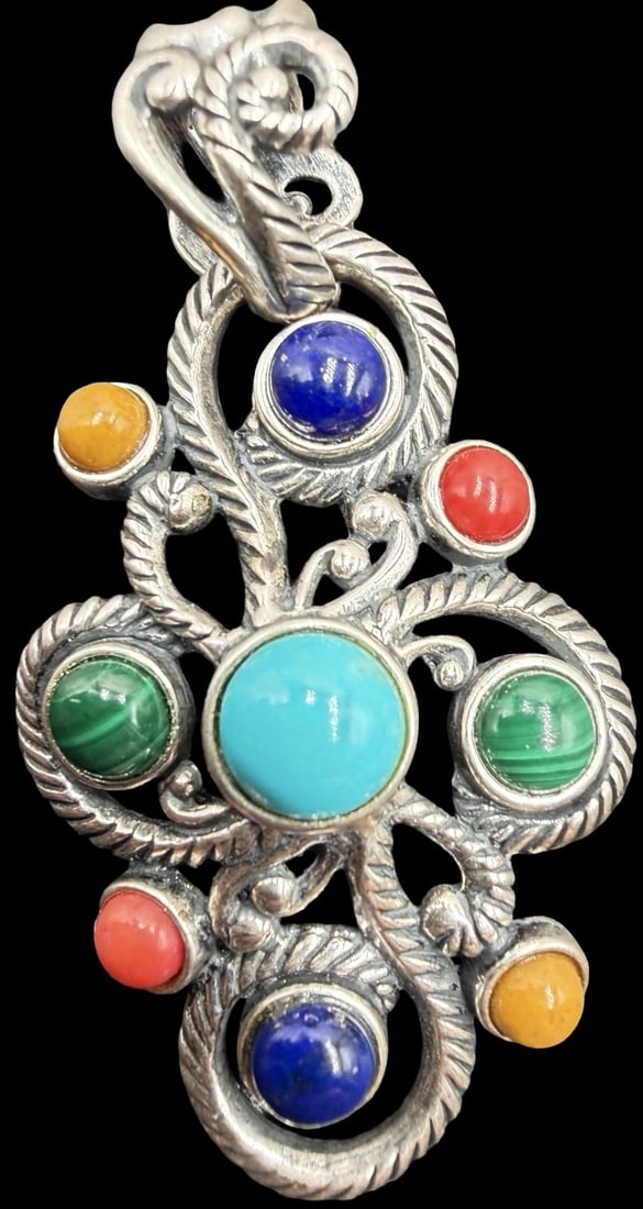 Stunning Ornate Vintage Native American Sterling Silver & Multi-colored Gemstone Pendant: Good vintage condition w/ patina and wear according to age and use, see pictures. Measures approx. 2" long and 3/4" wide and weighs ca. 9.9 grams. Tested for Sterling Silver