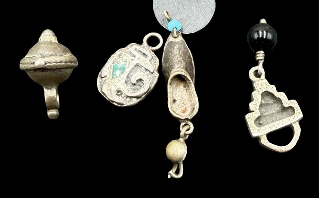 Beautiful Ornate Vintage Sterling Silver Set of 4 Different Pendants: Good vintage condition w/ patina and wear according to age and use, see pictures. Pendant measures approx. 1" long and 1/2" wide and weighs ca. 5.3 grams. Marked Sterling Silver