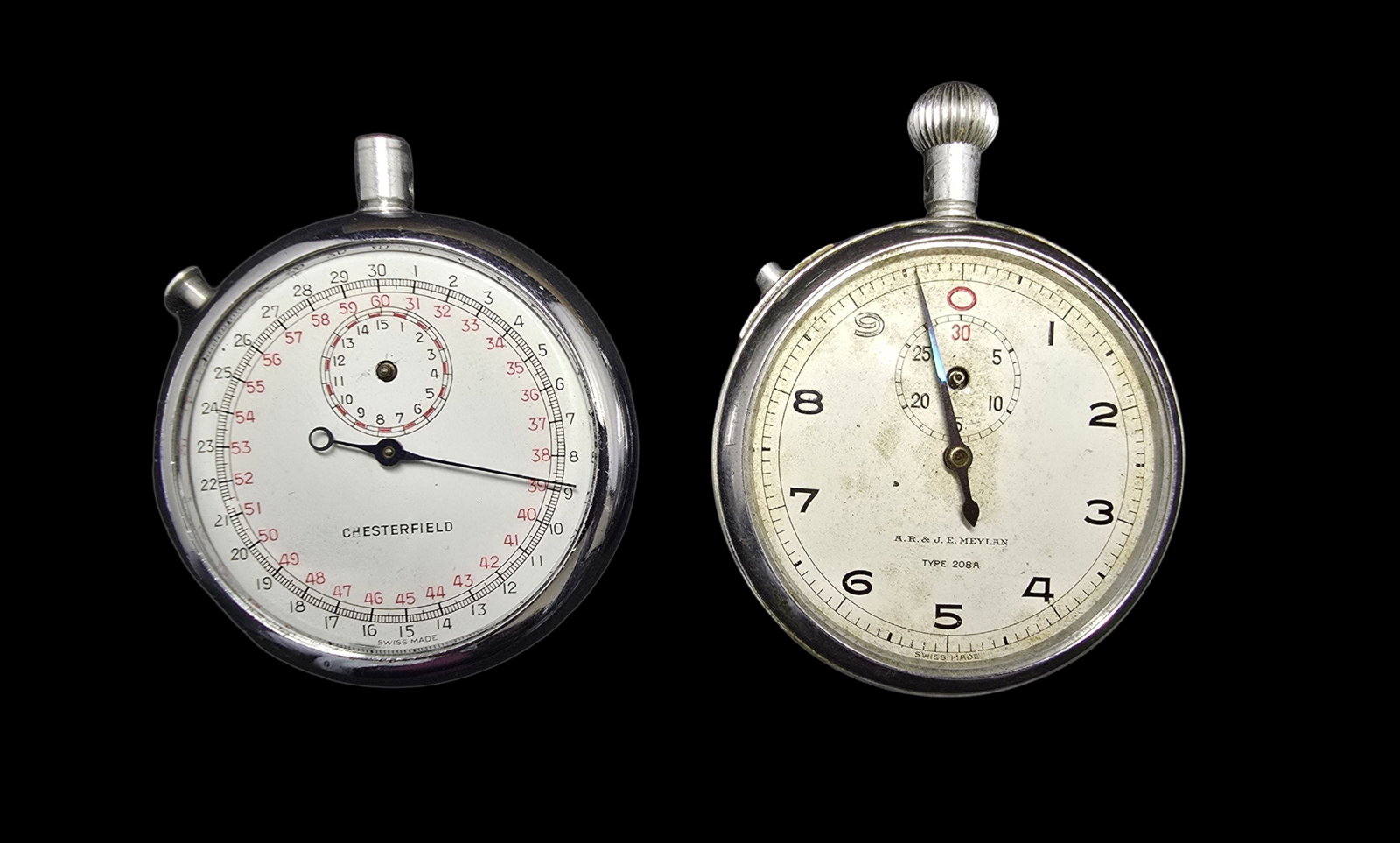 Stylish Pair of Vintage Pocket Stopwatches: Good vintage condition w/ minor patina according to age; Missing Arms, do not work. Measures approx. 2" long x 2" wide and weighs ca. 143 grams.
