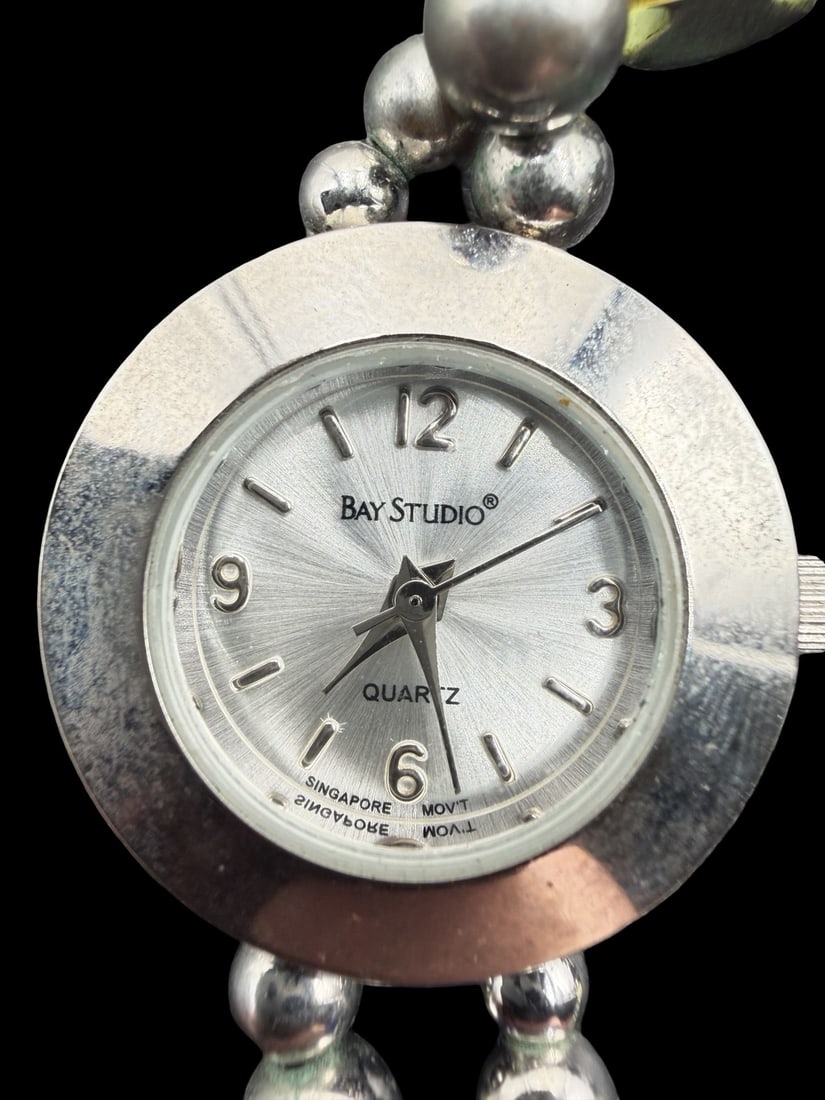 Beautiful Vintage BAY STUDIO Stainless Steel & Fish Motif Strap Quartz Watch: Good vintage condition w/ patina and wear according to age and use, see pictures. Dial measures approx. 3/4" long and 3/4" wide and weighs ca. 30.4 grams. Marked for BAY STUDIO. The timepiece is curre