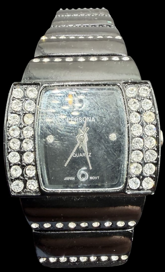 Gorgeous Vintage PERSONA Stainless Steel & Cluster Clean Rhinestones Quartz Watch: Good vintage condition w/ patina and wear according to age and use, see pictures. Measures approx. 1/2" long and 3/4" wide. Marked for PERSONA. Watch isn't working.